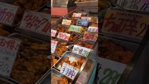 'Japanese street food, karaage (fried chicken) and kurroke (croquettes) at Jujo shoutengai.'