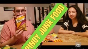 '(AMERICAN) HUSBAND AND DAUGHTER TRYING TO EAT FILIPINO JUNK FOODS'
