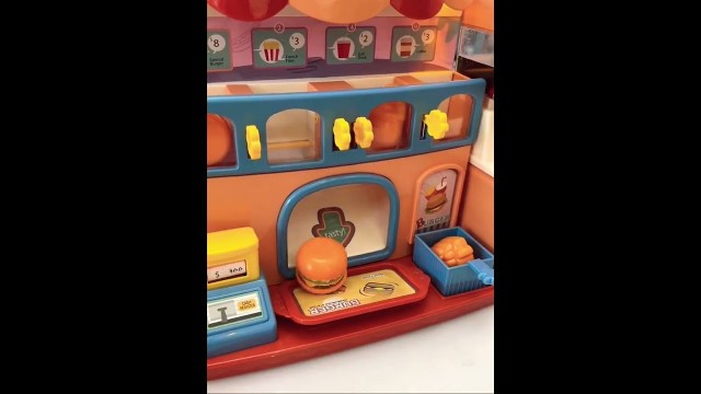 'Amazing food restaurant | new cash register with cold drink and burger toy'