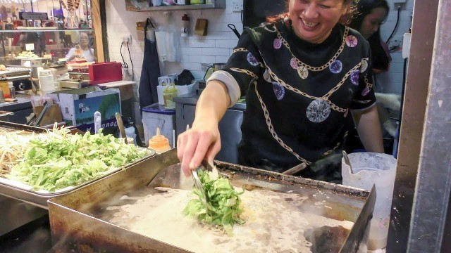 'Pancake of Fried Oysters. Strange Chinese Street Food of Hong Kong'