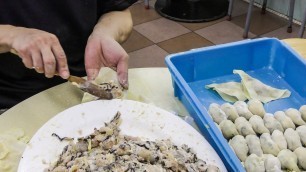 'Hong Kong Food Experience. Preparing the Shrimp Dumplings. Seen in Causeway Bay'