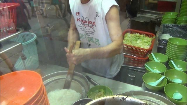 'Hong Kong Street Food. Street Restaurant in a Small Alley in Mong Kok. Probably a Dai Pai Dong'