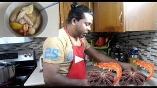 'cooking  Caribbean food octopus and shrimp soup'