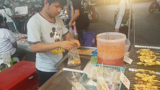'Bangkok street food - grilled octopus and cuttlefish'