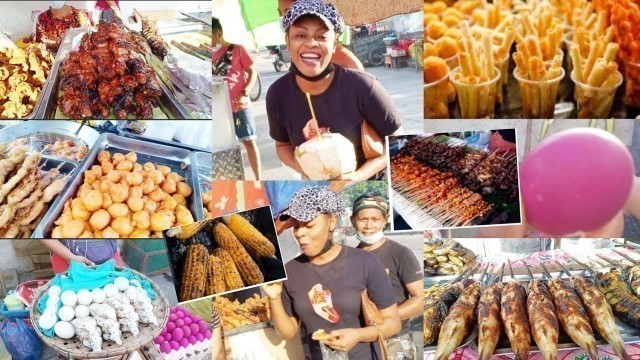 'Nigerians Try FILIPINO Street Food | Octopus | Balut | street food tour'