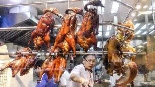 'The Chinese Roasted Duck Tasted in Mong Kok, Hong Kong. Chinese Street Food.'
