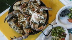 'Seafood, Oysters, Crabs and Octopus on Grill. Warsaw Street Food, Poland'