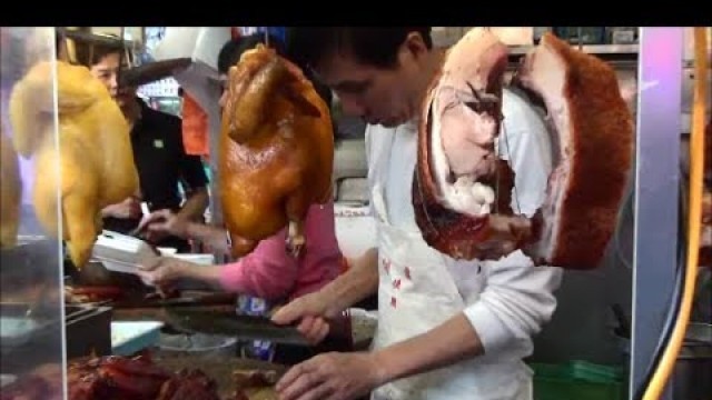 'Hong Kong Street Food. Action in the Kitchen in Mong Kok, Kowloon'