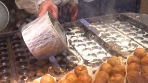'Japanese Street Food - Takoyaki (Octopus Bread)'