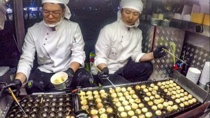 'Korea Street Food. Great Skills Making \'Takoyaki\' Octopus Balls. Bamdokkaebi Night Market, Seoul'