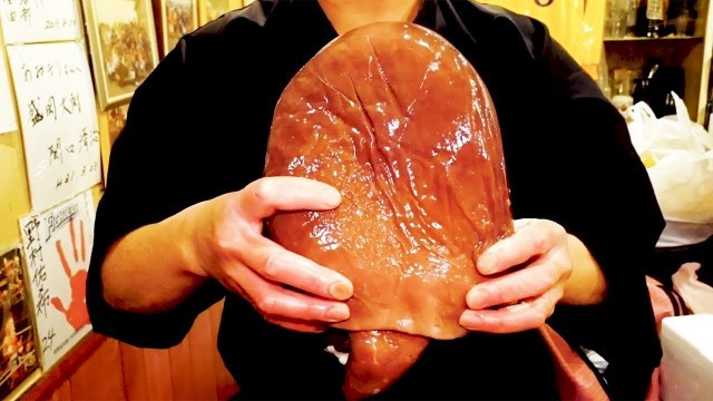'Giant octopus Tempura and Sashimi - Japanese Street Food'
