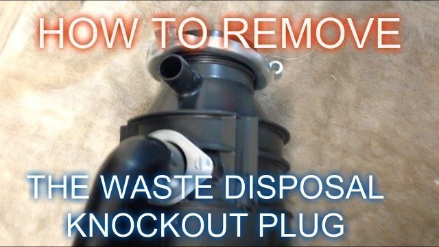 'How to Remove the Knockout plug from food disposal'