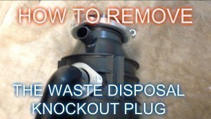 'How to Remove the Knockout plug from food disposal'