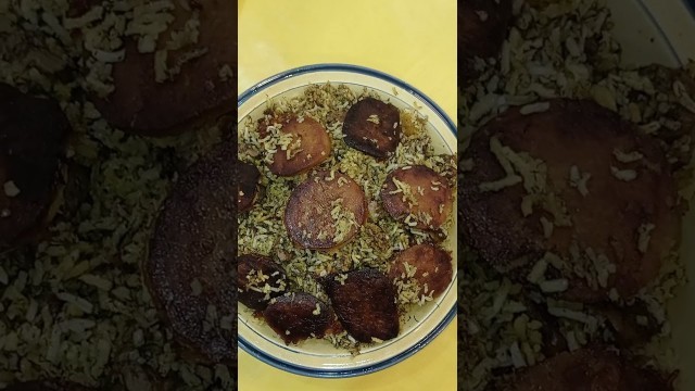 'Iranian food.                                       سبزی پلو با گوشت'