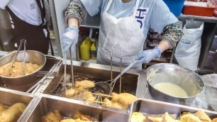 'Deep Fried Chicken tasted in Mong Kok. Street Food of Hong Kong'