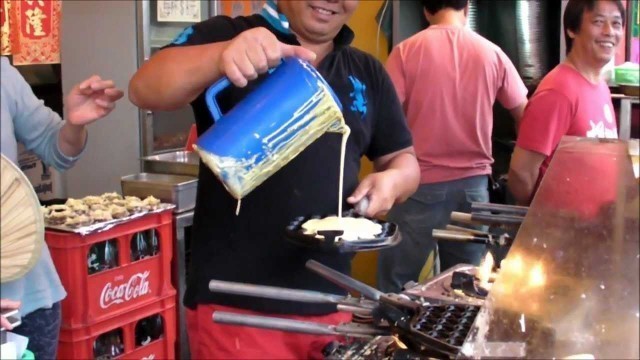 'Hong Kong Street Food. Egg Waffles (Gei Dan Jai) in Cheung Chau (an Hong Kong outlying island)'