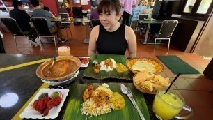 'Eating Indian Food - Banana Leaf Platter'